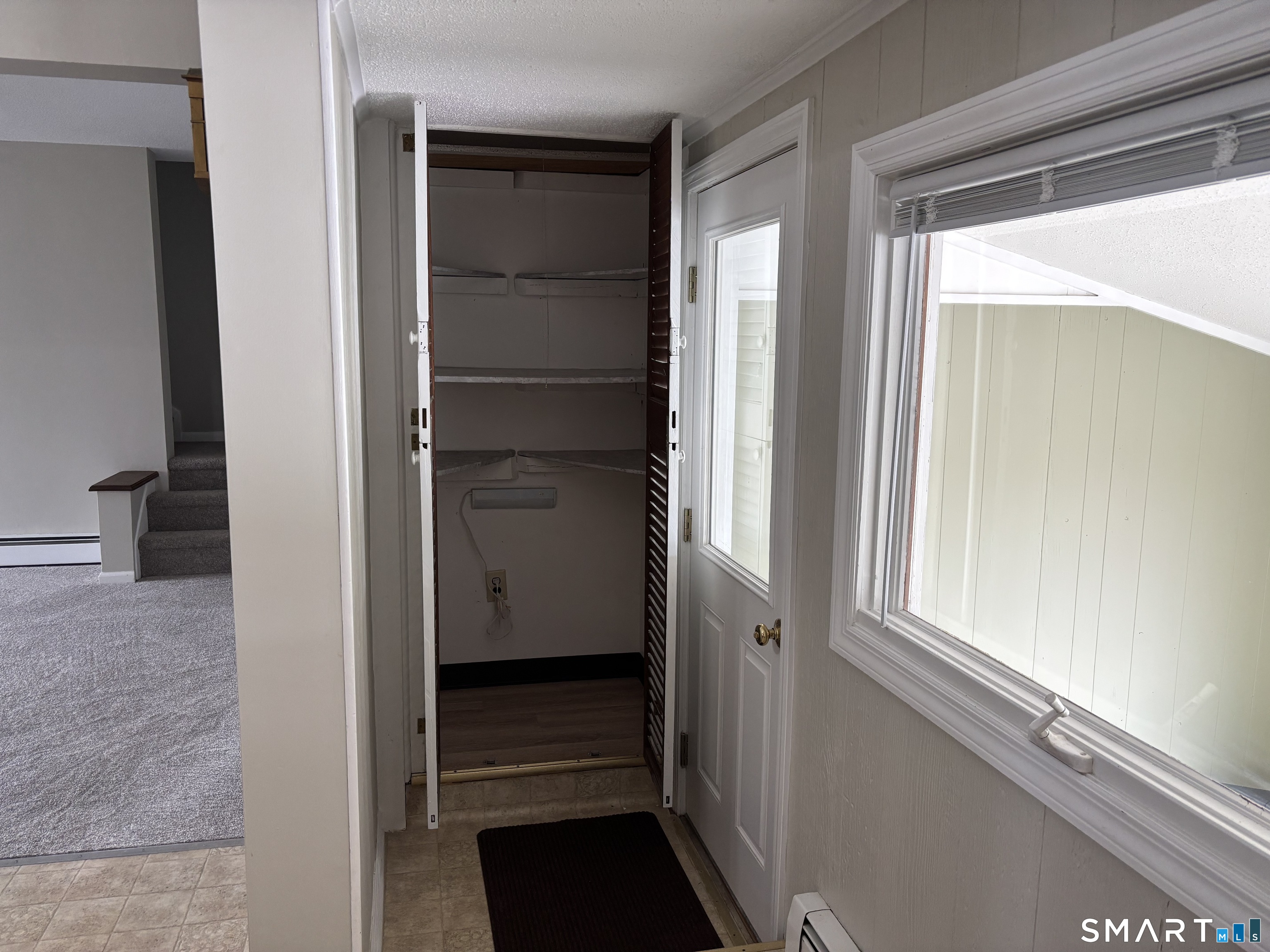 324 Savage Hill Road Berlin, CT 06037 - Photo 21 of 27 a view of walk in closet with empty racks