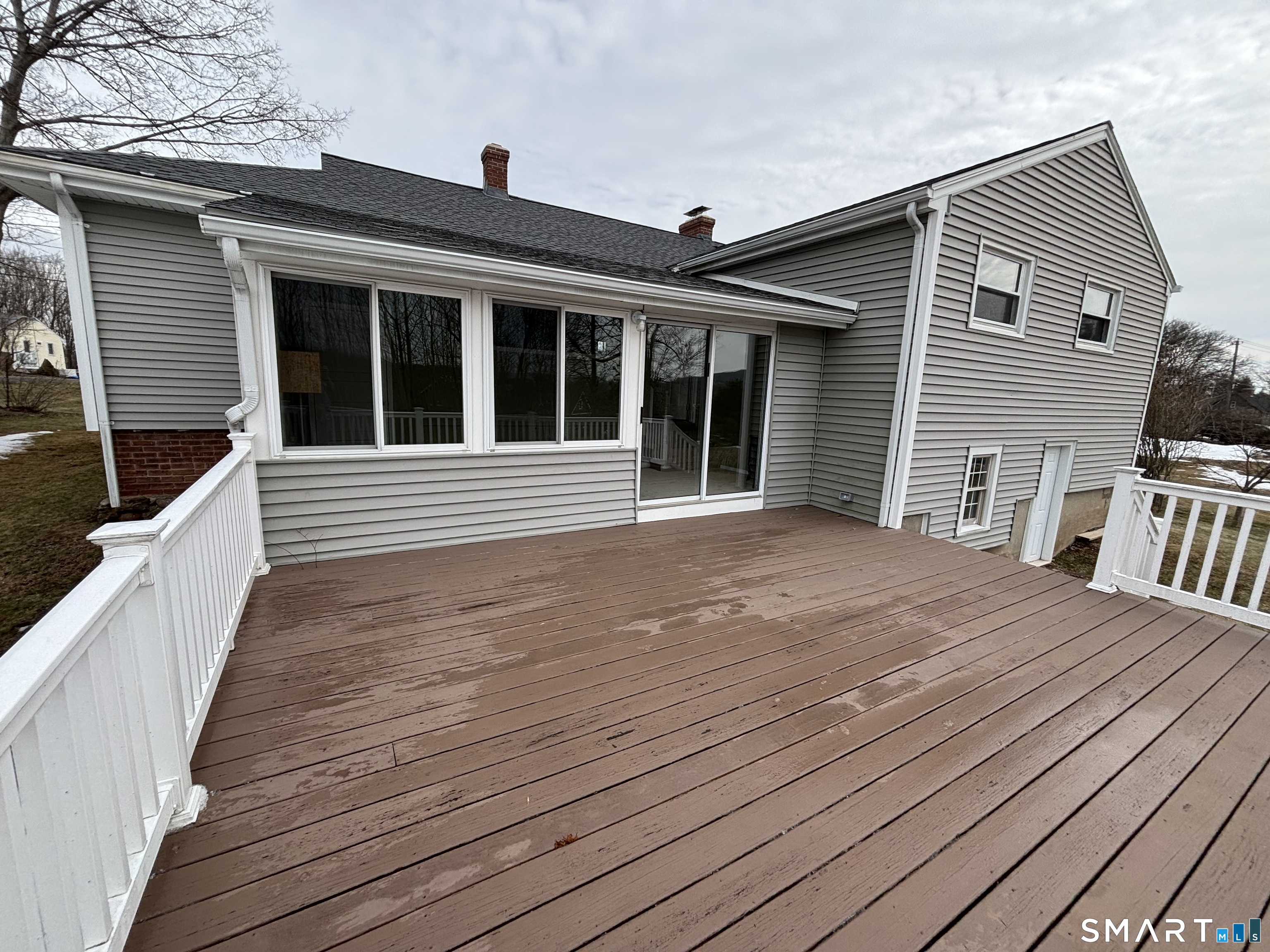 324 Savage Hill Road Berlin, CT 06037 - Photo 25 of 27 a view of a house with wooden deck