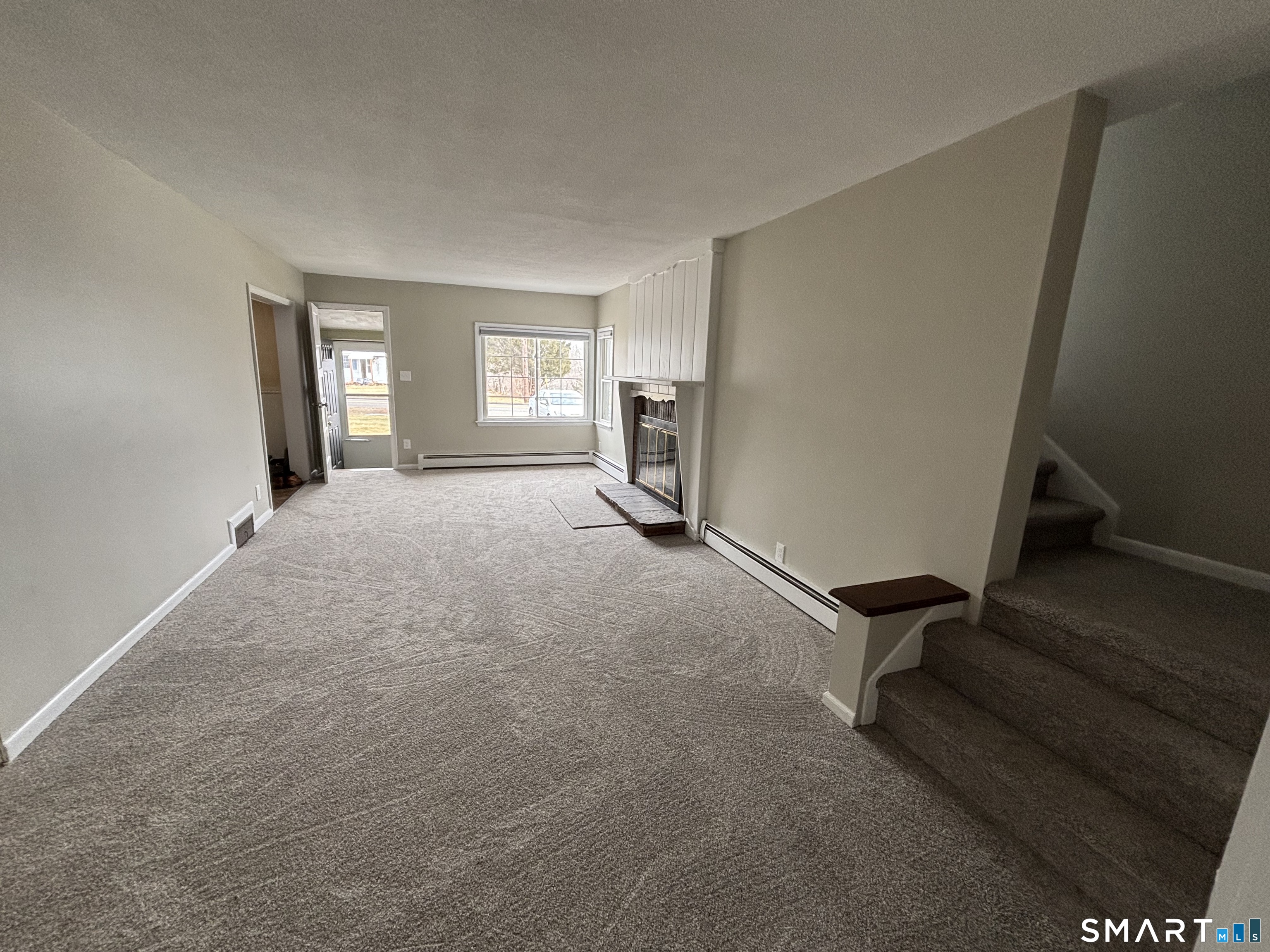 324 Savage Hill Road Berlin, CT 06037 - Photo 3 of 27 an empty room with windows