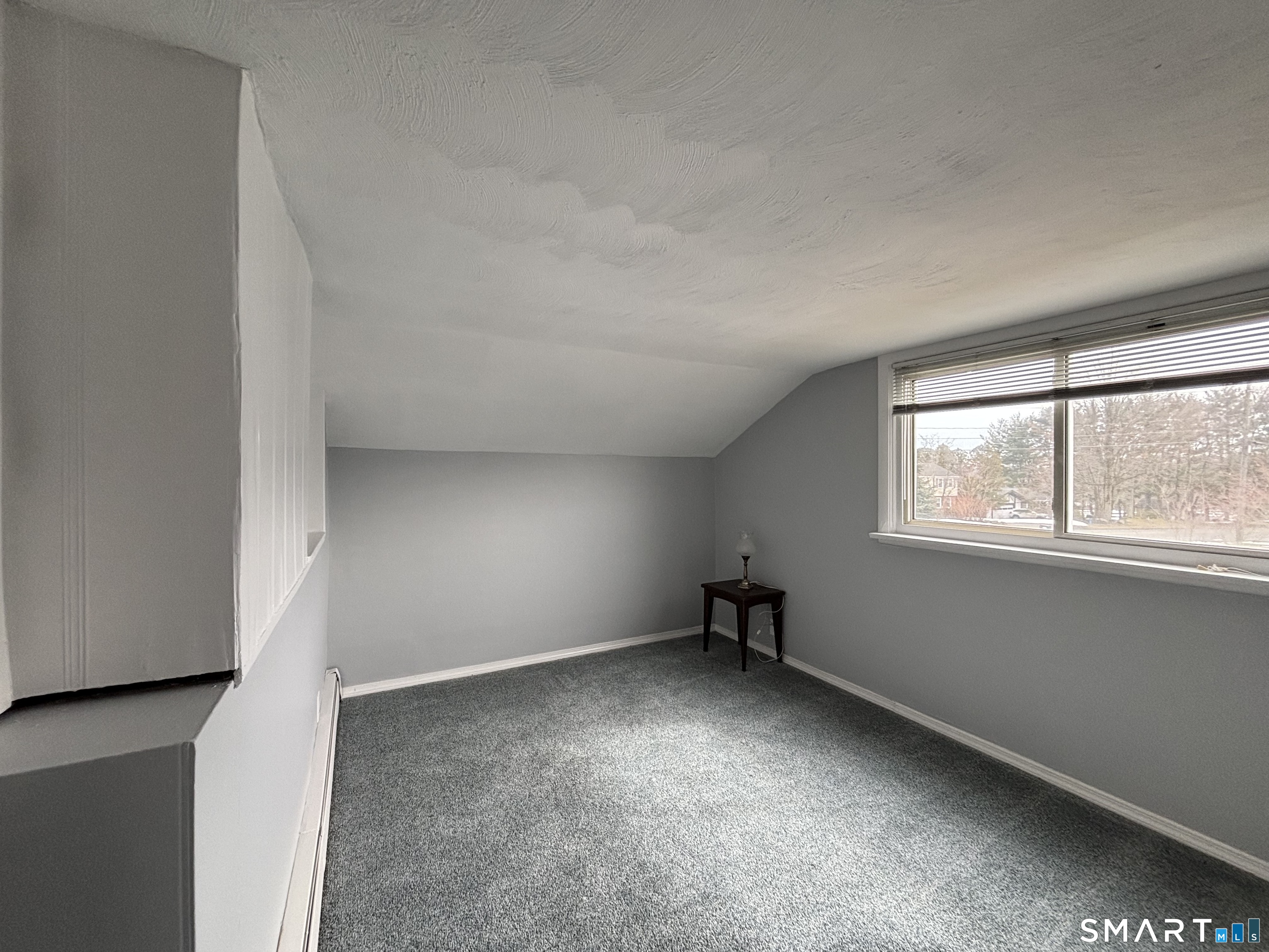 324 Savage Hill Road Berlin, CT 06037 - Photo 10 of 27 an empty room with a window