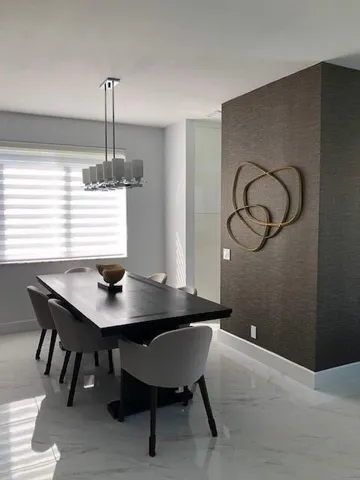 a workspace with furniture and window