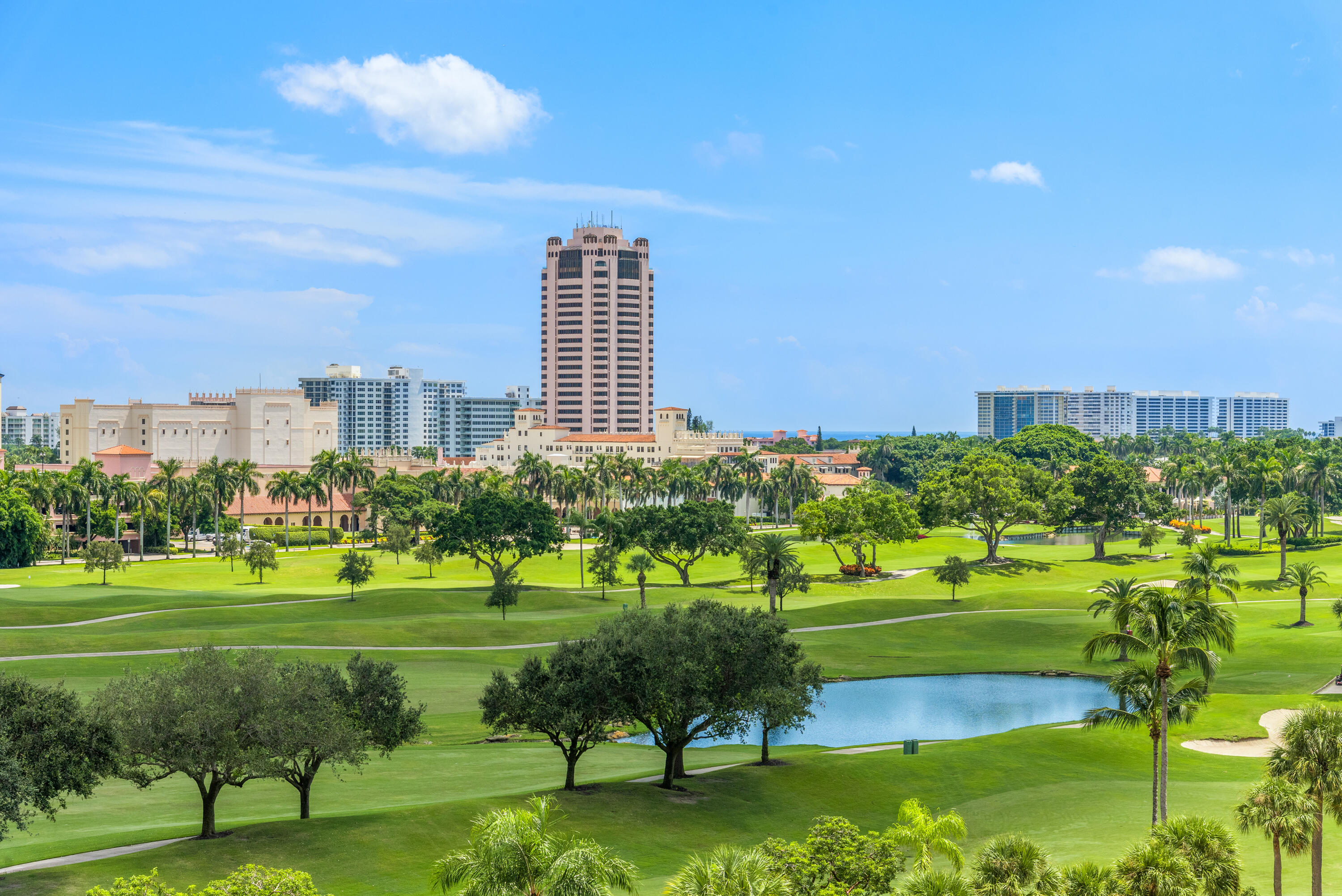 210 Southeast Mizner Boulevard, Unit 604 Boca Raton, FL 33432 - Photo 17 of 19 a view of a golf course with a lake