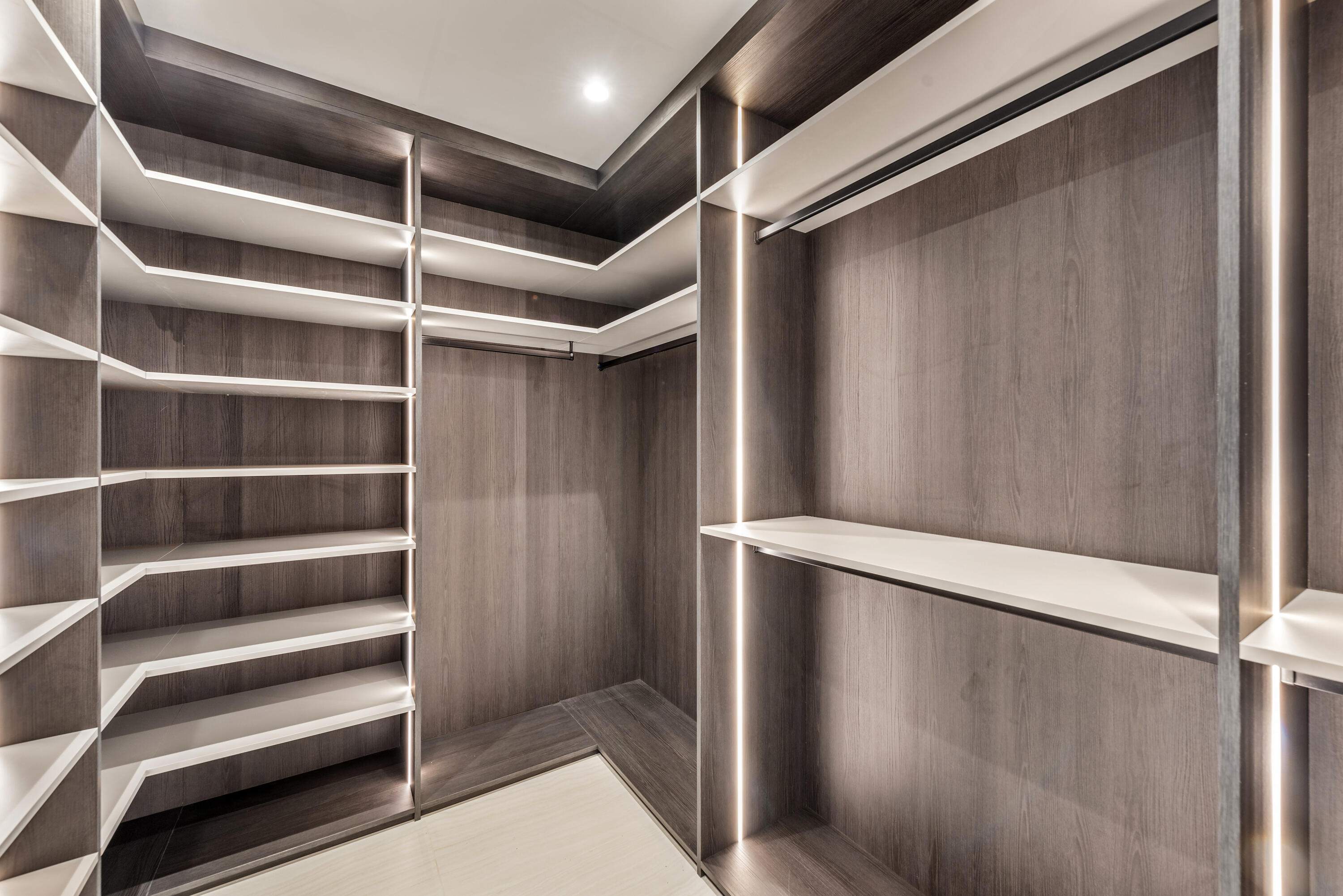 210 Southeast Mizner Boulevard, Unit 604 Boca Raton, FL 33432 - Photo 9 of 19 a view of walk in closet with empty racks