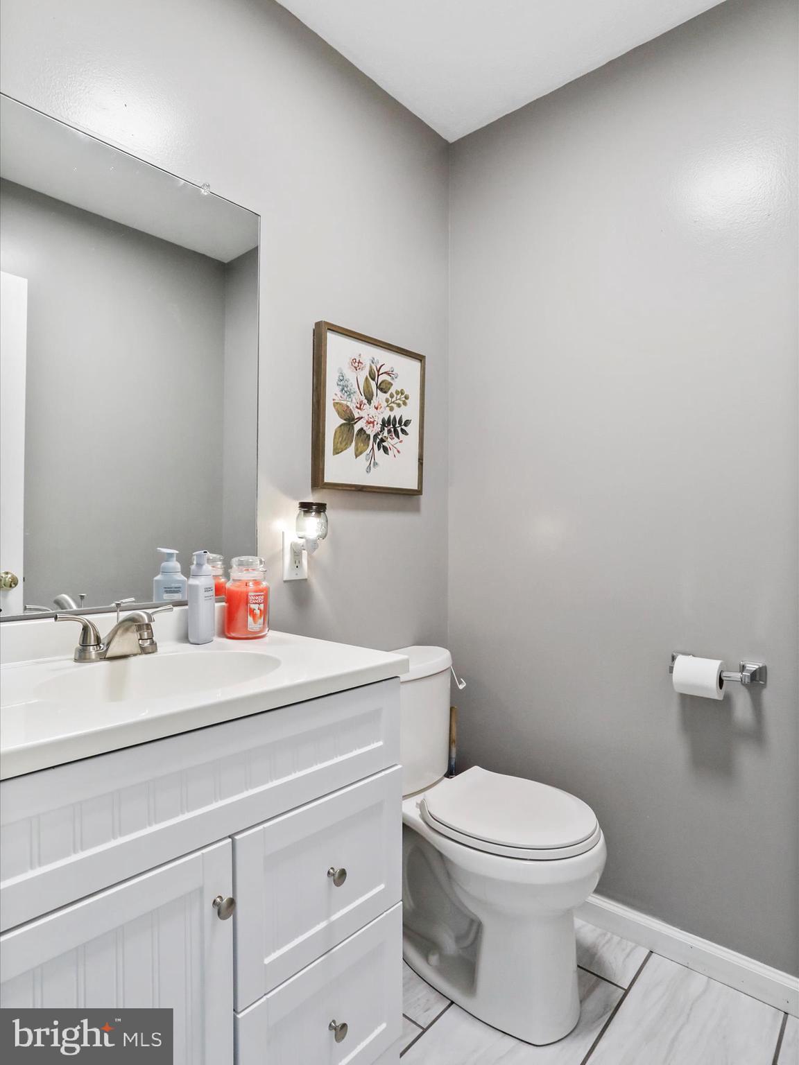 339 D Street Keyser, WV 26726 - Photo 13 of 47 a white toilet sitting next to a bathroom sink