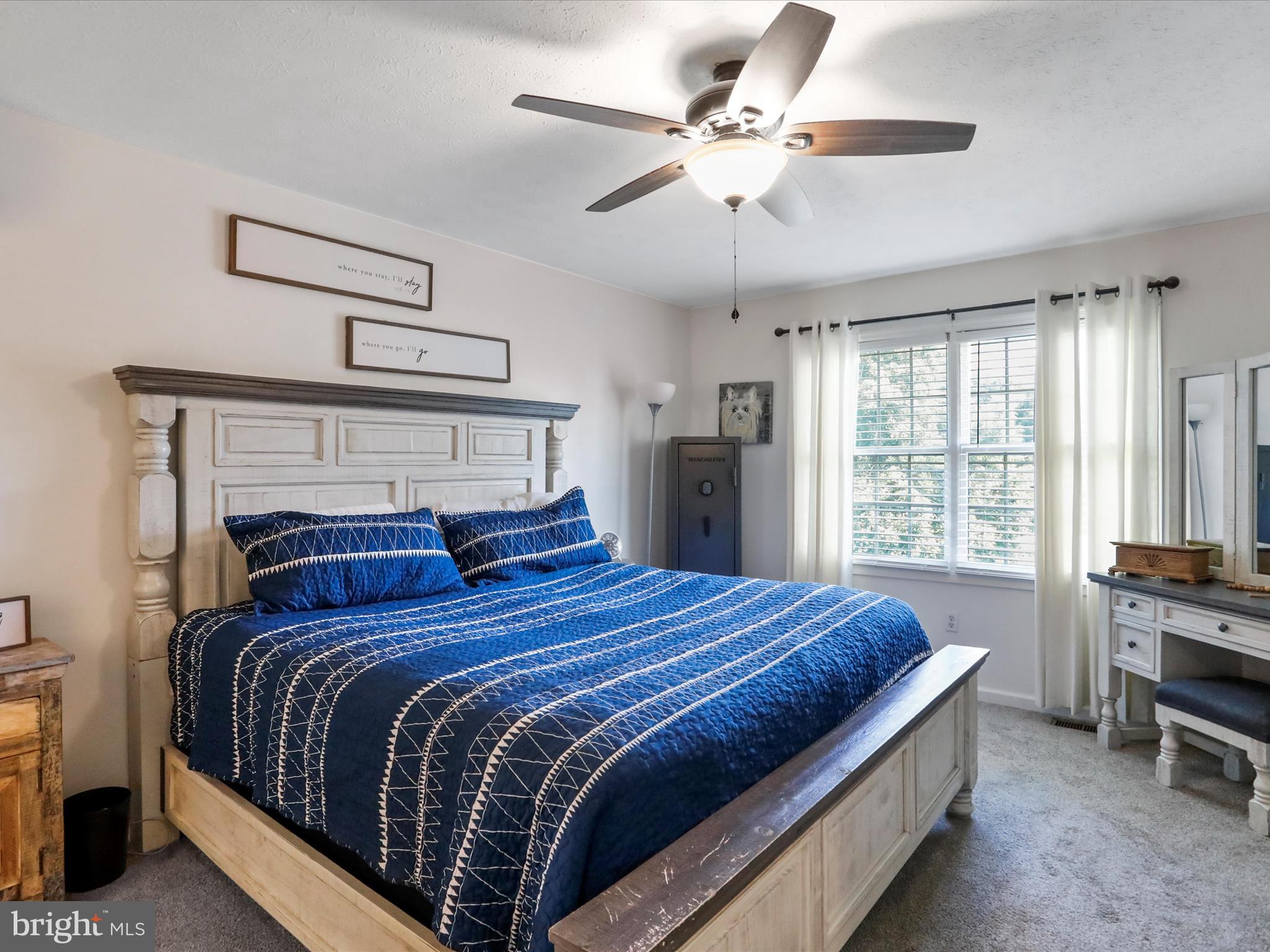 339 D Street Keyser, WV 26726 - Photo 22 of 47 a bedroom with a large bed and a ceiling fan