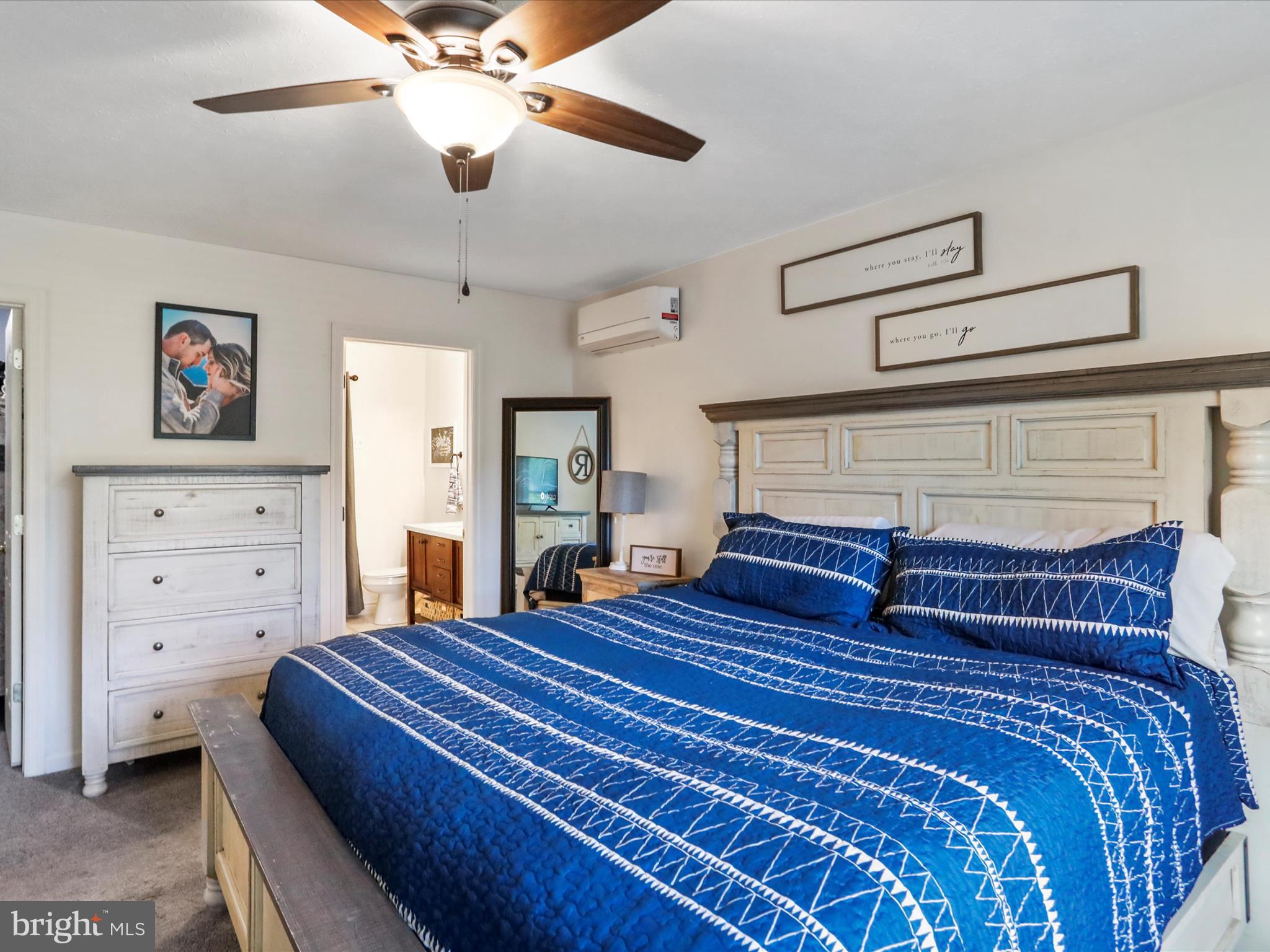 339 D Street Keyser, WV 26726 - Photo 23 of 47 a bedroom with a bed and a chandelier