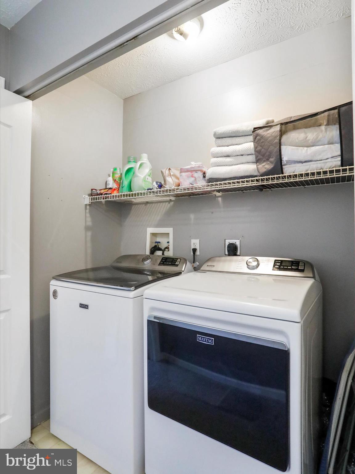 339 D Street Keyser, WV 26726 - Photo 27 of 47 a kitchen with a stove a sink and a microwave