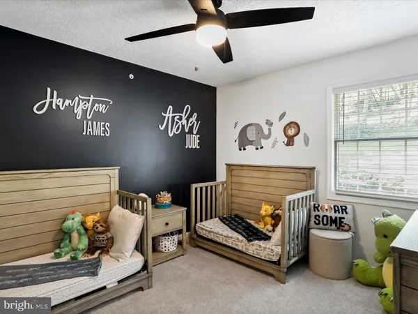 a bedroom with a bed and furniture