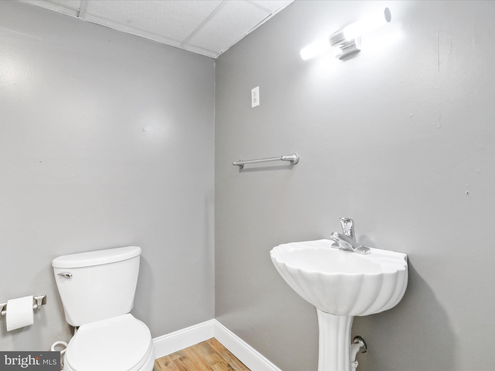 339 D Street Keyser, WV 26726 - Photo 37 of 47 a bathroom with a toilet sink and mirror