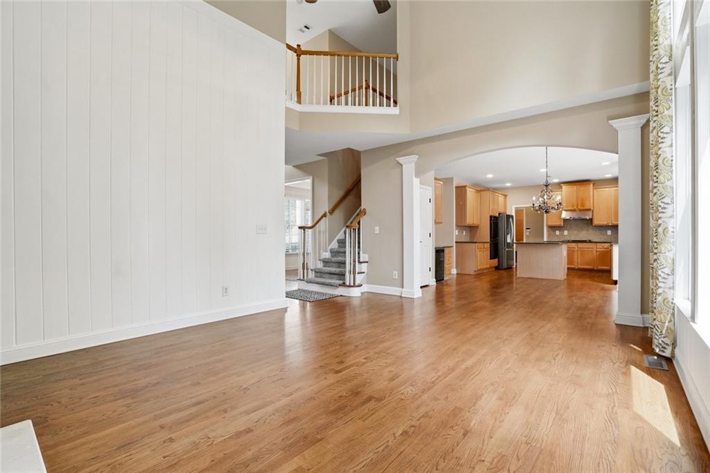855 Freedom Way Cumming, GA 30040 - Photo 11 of 25 a view of an entryway with wooden floor