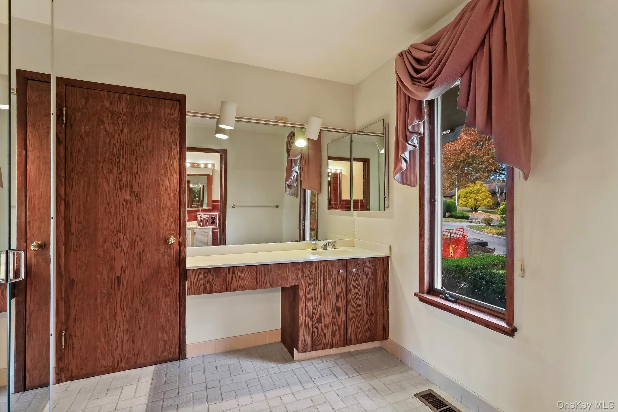 37 Century Trail Harrison, NY 10528 - Photo 20 of 43 Full bath with vanity and baseboards