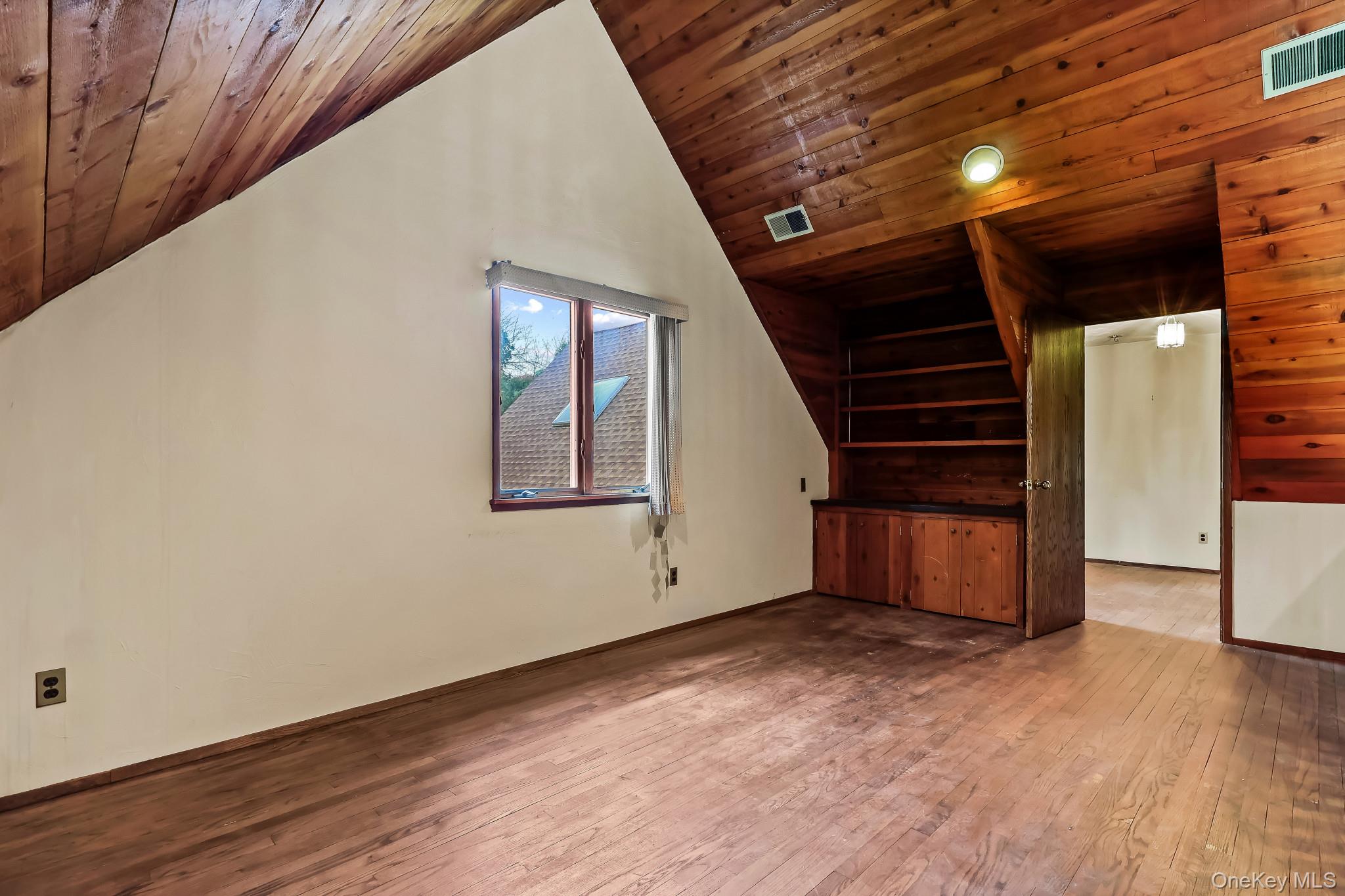 37 Century Trail Harrison, NY 10528 - Photo 25 of 43 Bonus room with hardwood / wood-style flooring, vaulted ceiling, and wood ceiling
