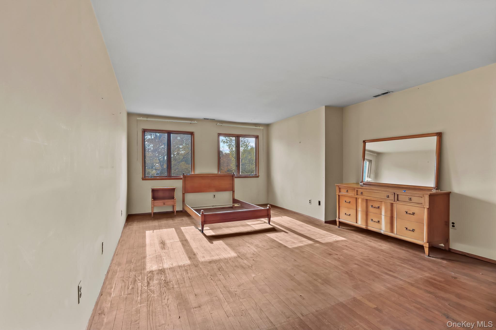 37 Century Trail Harrison, NY 10528 - Photo 29 of 43 Bedroom featuring wood-type flooring and baseboards