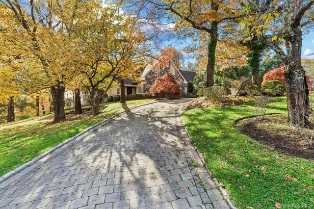a bathroom with a sink a mirror and a shower