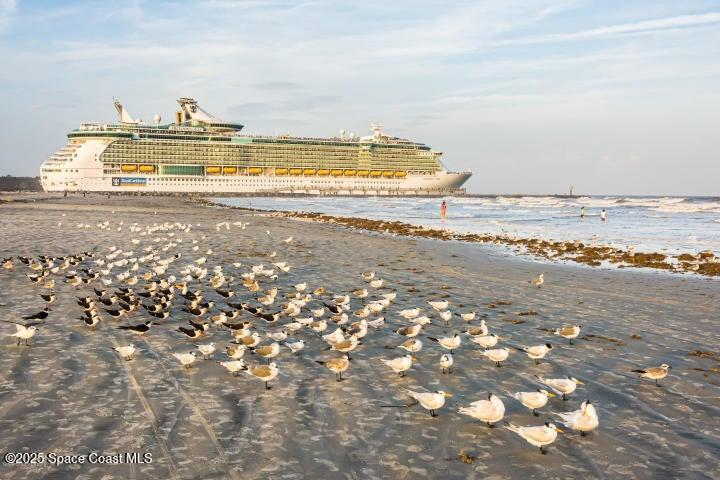 801 South Brevard Avenue, Unit K Cocoa Beach, FL 32931 - Photo 11 of 14 a view of an ocean and beach