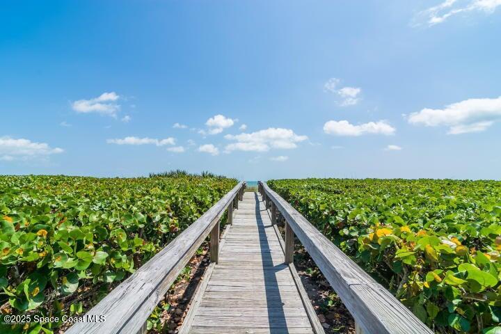 801 South Brevard Avenue, Unit K Cocoa Beach, FL 32931 - Photo 10 of 14 a view of balcony with wooden floor