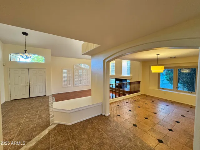 a bathroom with a tub sink and shower