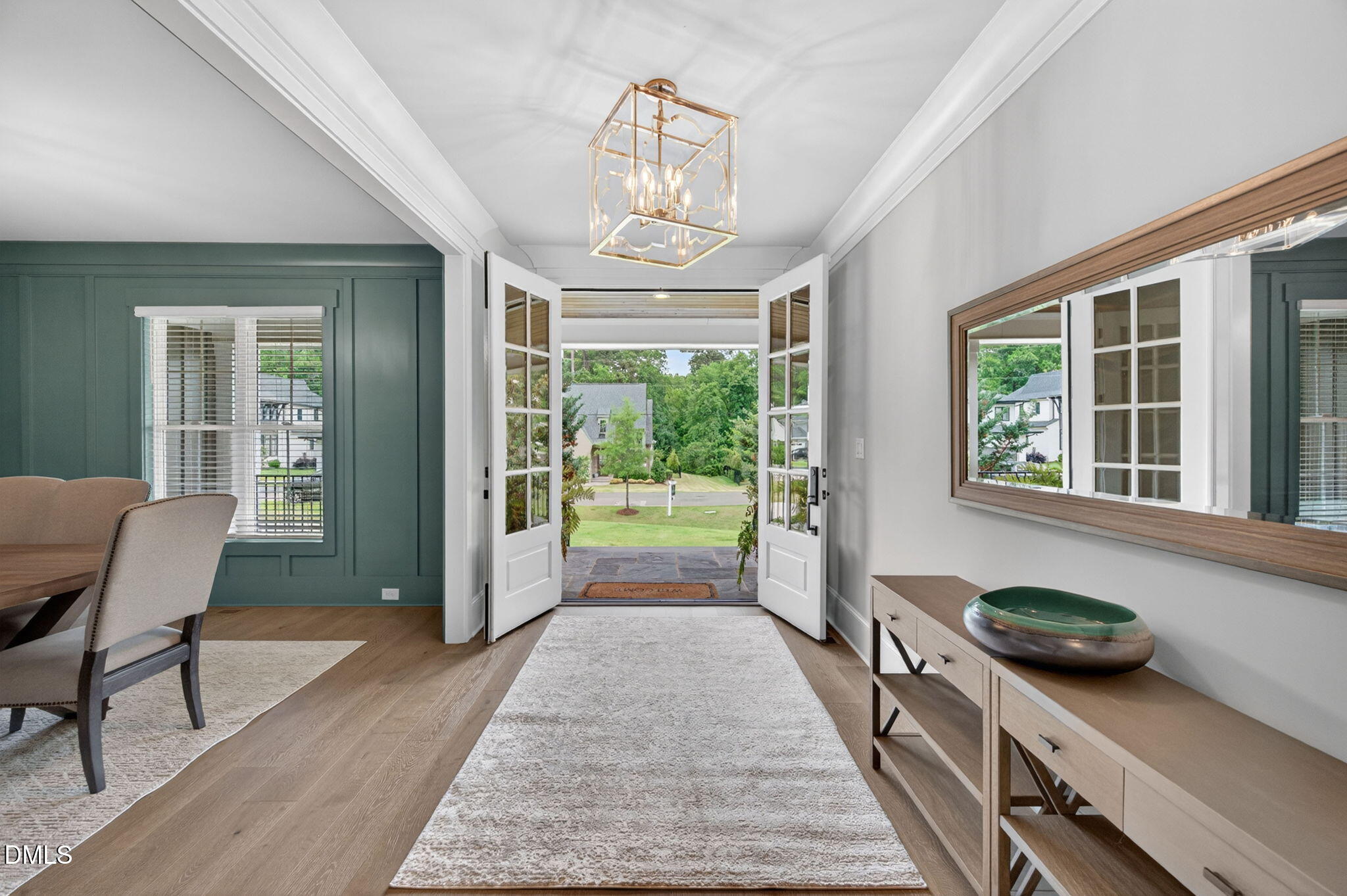 3417 Edgemont Drive Raleigh, NC 27612 - Photo 3 of 83 a view of a room with furniture large windows and wooden floor