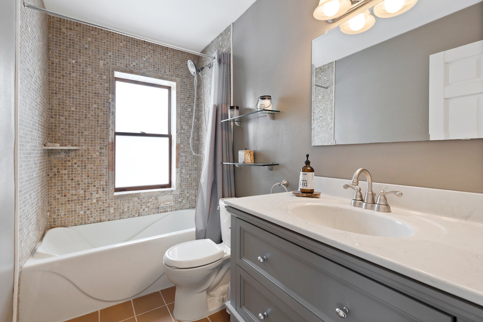10N849 Rippburger Road Elgin, IL 60124 - Photo 13 of 36 a bathroom with a sink a toilet and a bathtub