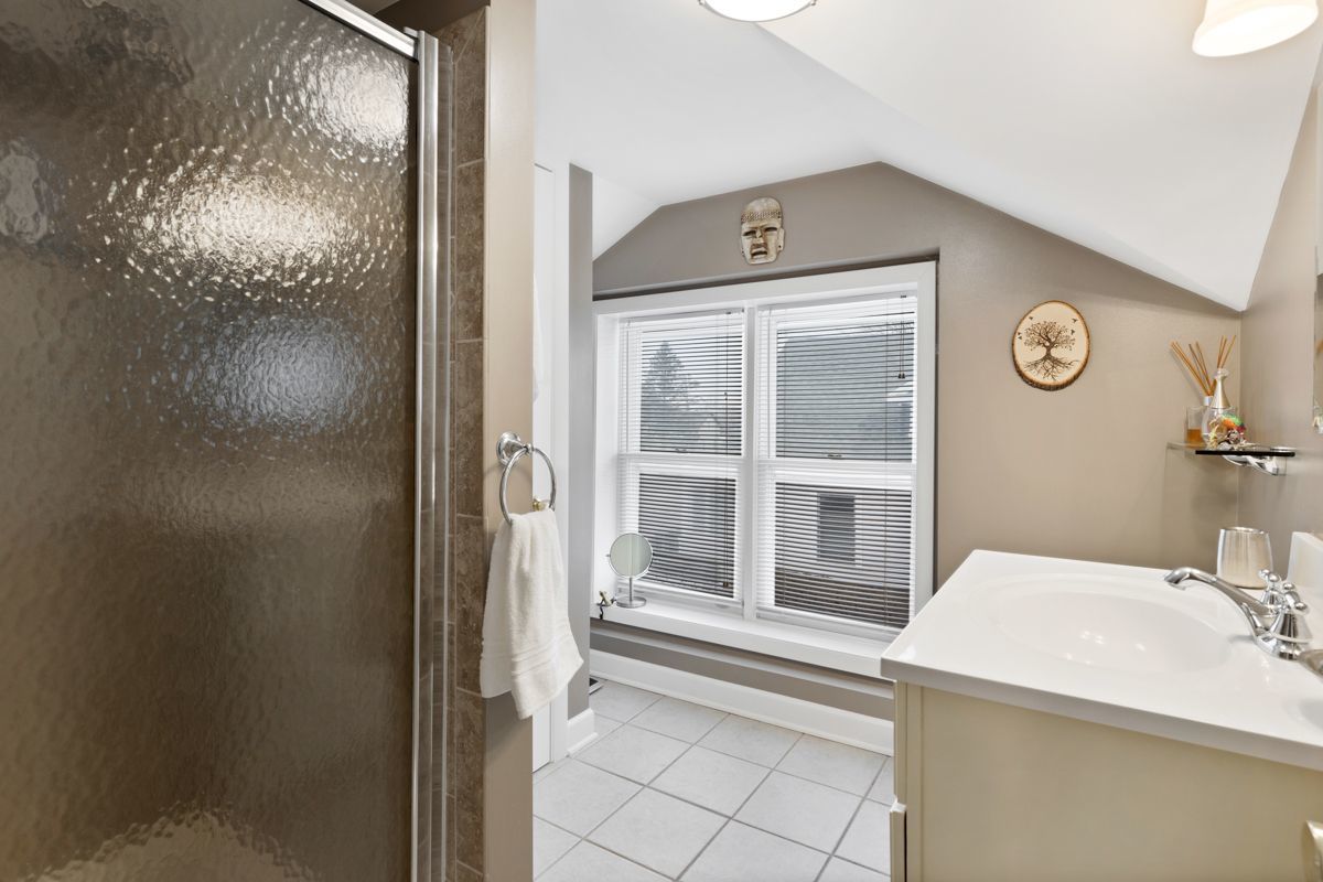 10N849 Rippburger Road Elgin, IL 60124 - Photo 20 of 36 a bathroom with a sink and a mirror
