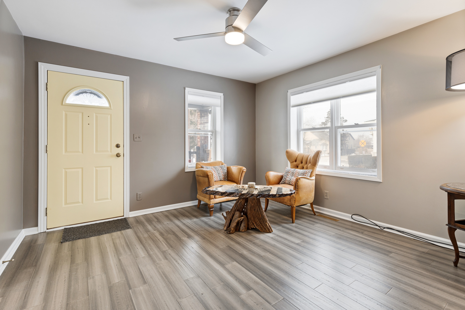 10N849 Rippburger Road Elgin, IL 60124 - Photo 10 of 36 a view of a livingroom with wooden floor and a window