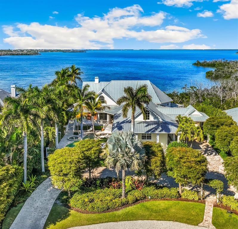 a view of a swimming pool with an outdoor space and seating area