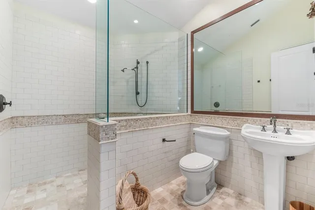 a view of a outdoor dining space with furniture and wooden floor