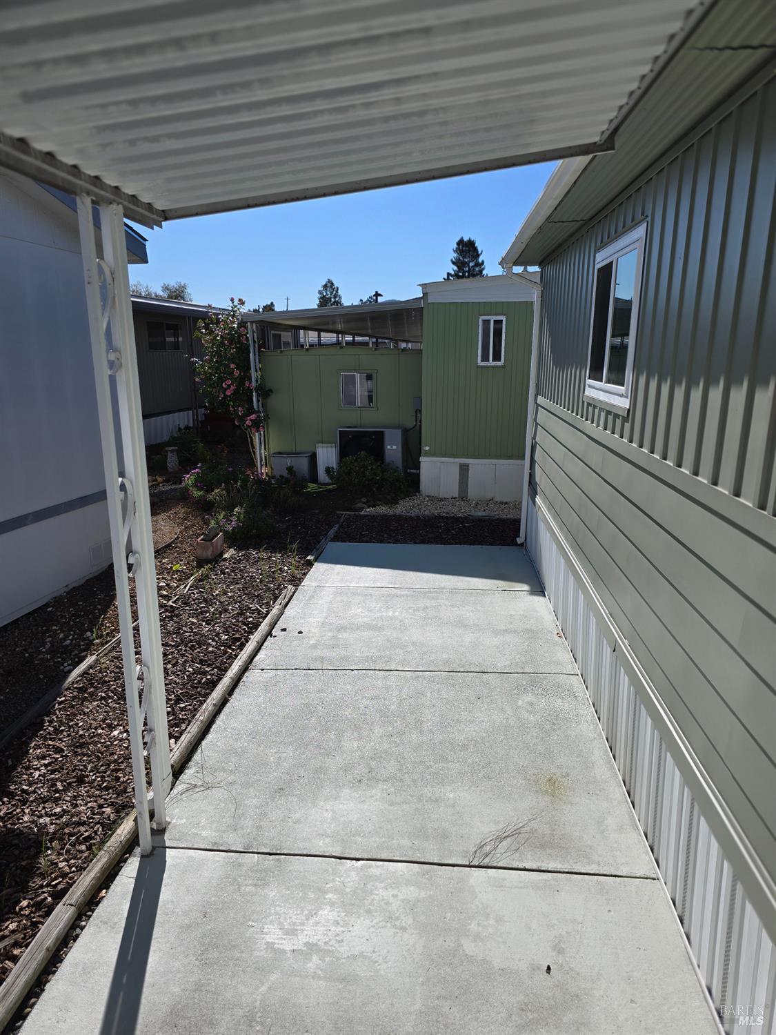 108 Cardinal Way Santa Rosa, CA 95409 - Photo 16 of 20 a view of a porch with a hanging chair