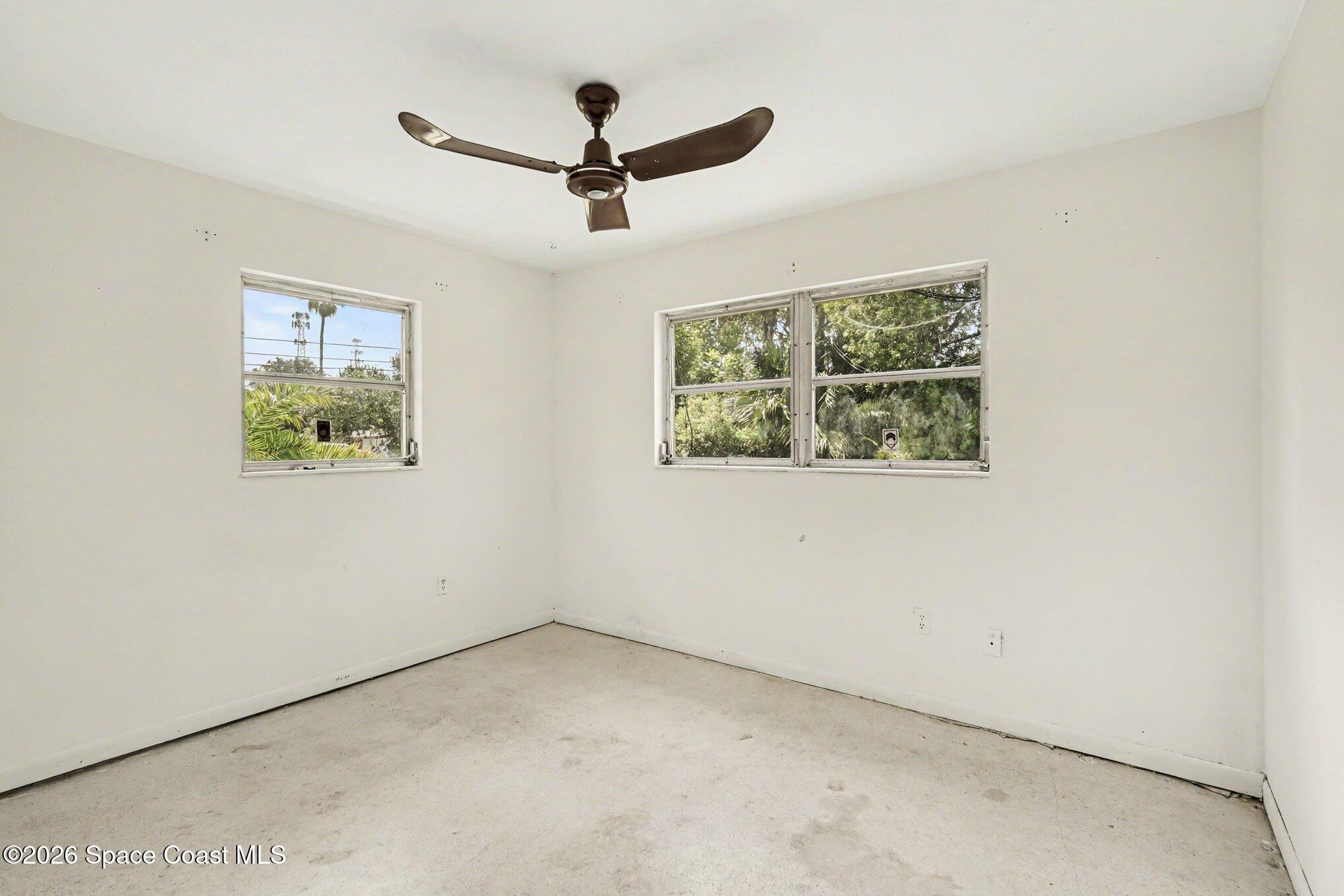 1406 Northeast Tropicana Road Palm Bay, FL 32905 - Photo 11 of 37 015_file_7358
