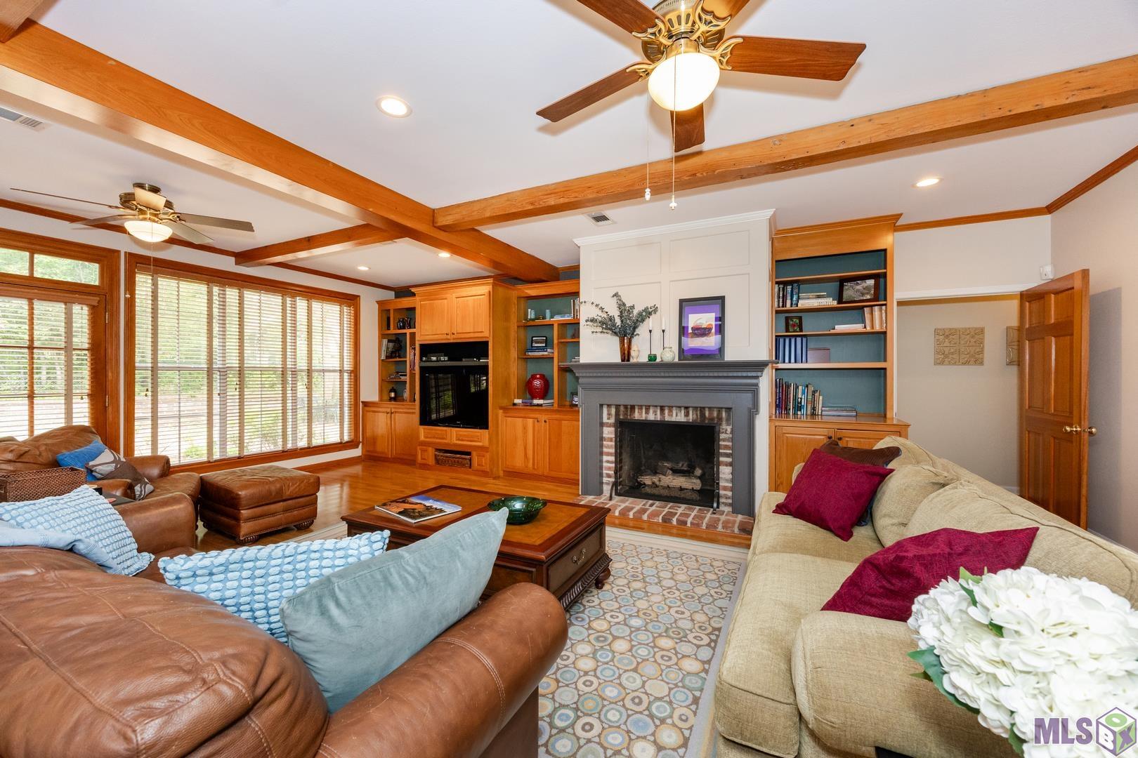 317 West Woodstone Court Baton Rouge, LA 70808 - Photo 15 of 48 Gas Fireplace and Beautiful Built Ins