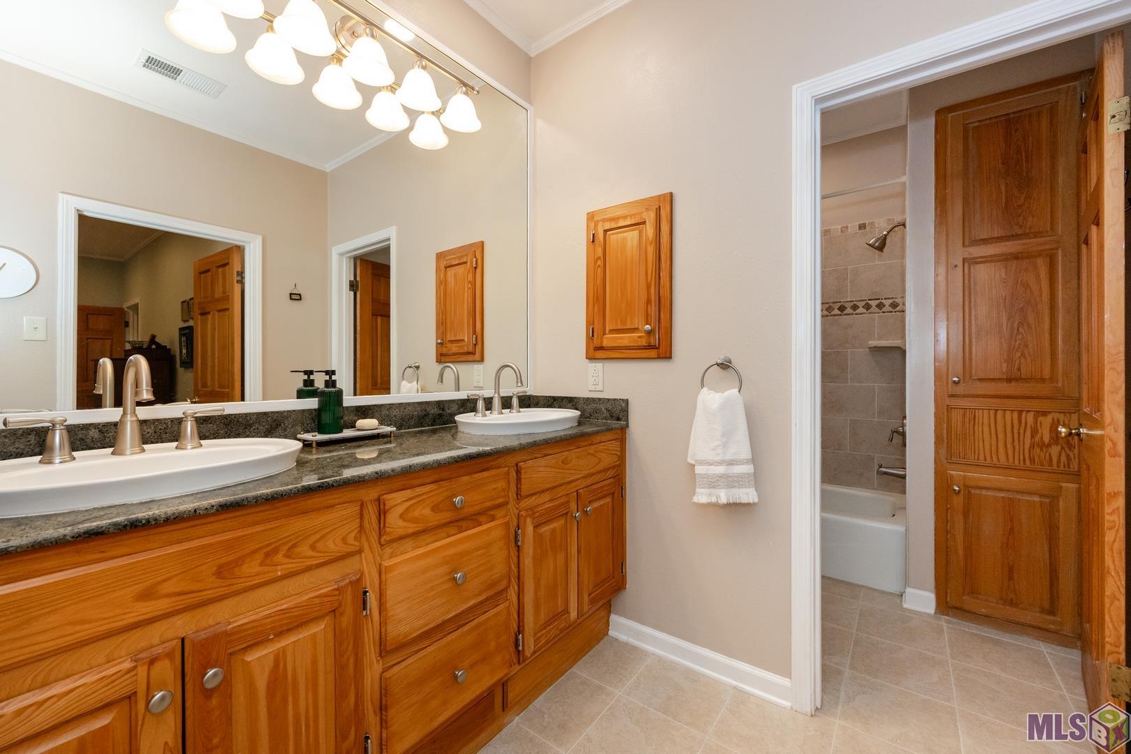 317 West Woodstone Court Baton Rouge, LA 70808 - Photo 19 of 48 Double Vanity in the Primary Bathroom