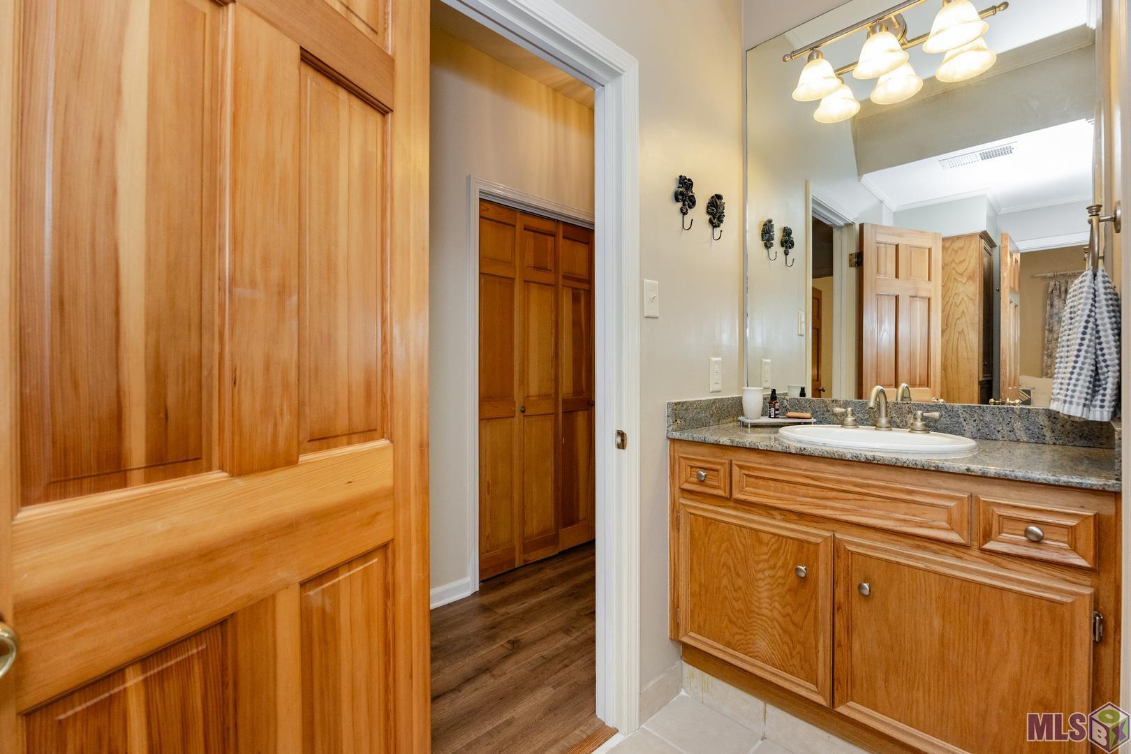 317 West Woodstone Court Baton Rouge, LA 70808 - Photo 28 of 48 Downstairs Hall Bath Vanity