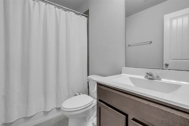 a bathroom with a sink and a toilet