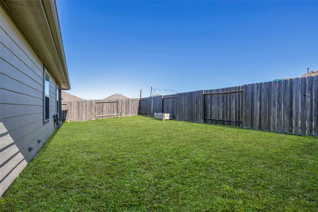 a view of a backyard with garden