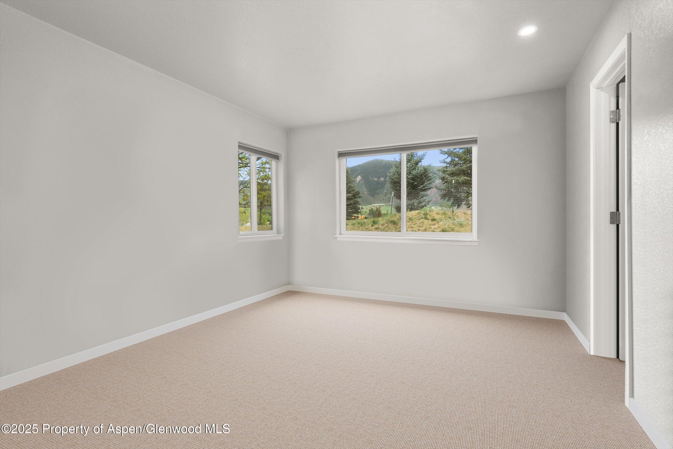 21 Pine Ridge Road Basalt, CO 81621 - Photo 17 of 25 an empty room with windows