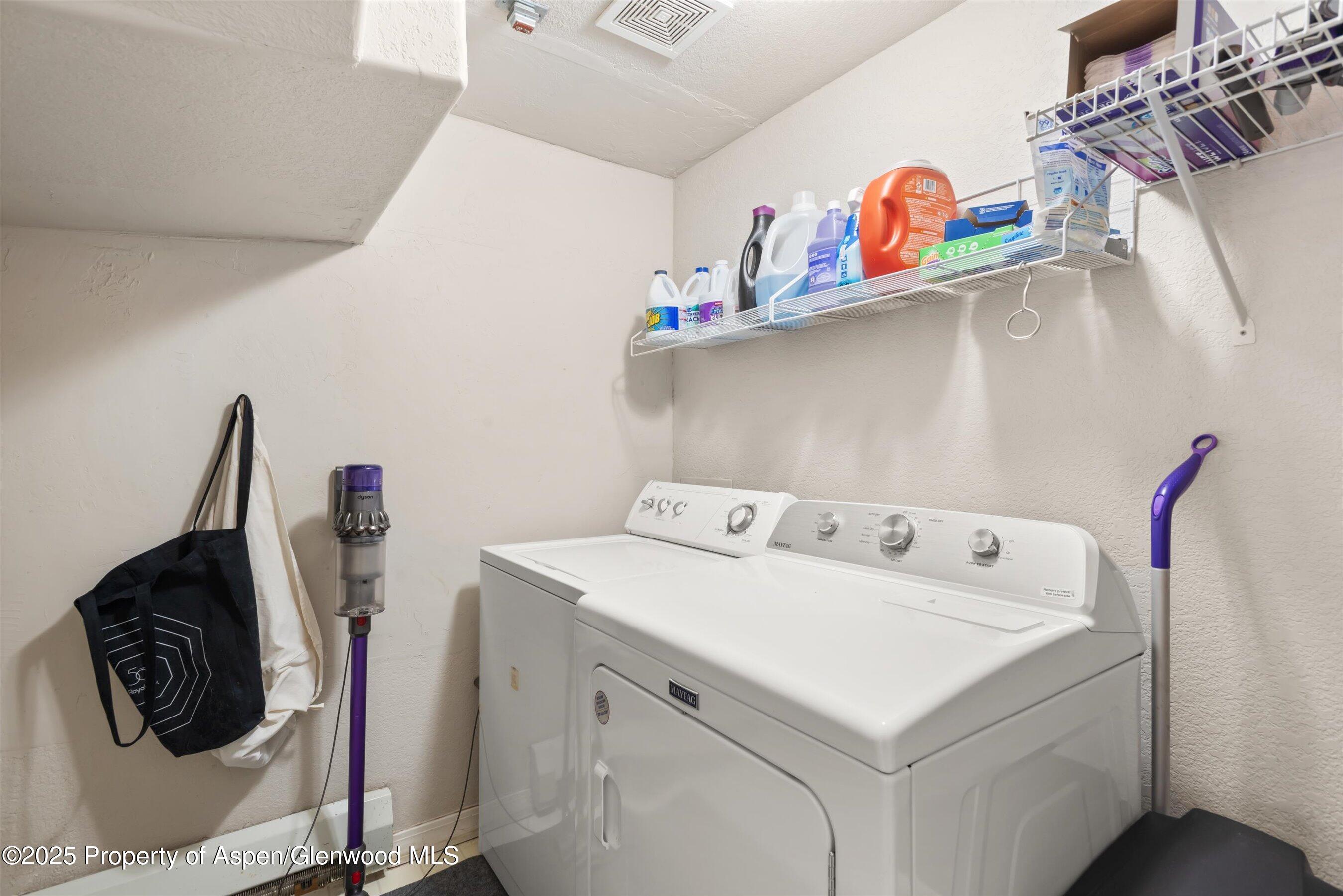 21 Pine Ridge Road Basalt, CO 81621 - Photo 22 of 25 a utility room with dryer and washer