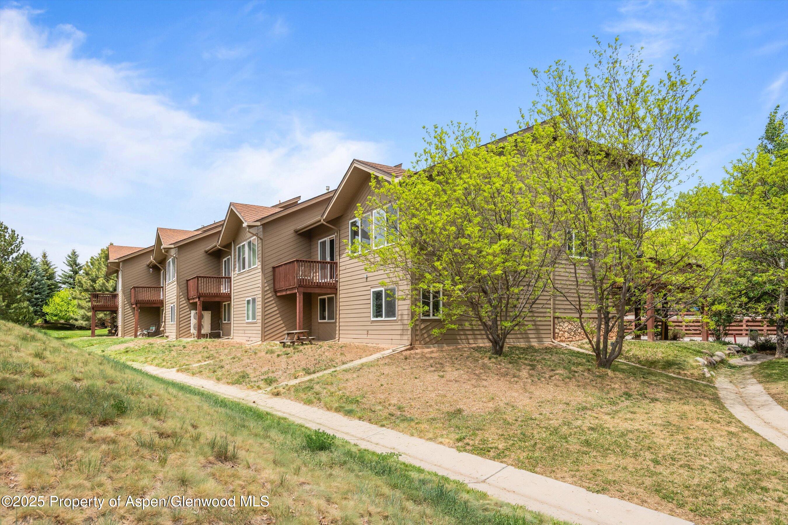21 Pine Ridge Road Basalt, CO 81621 - Photo 24 of 25 a front view of a house with a yard