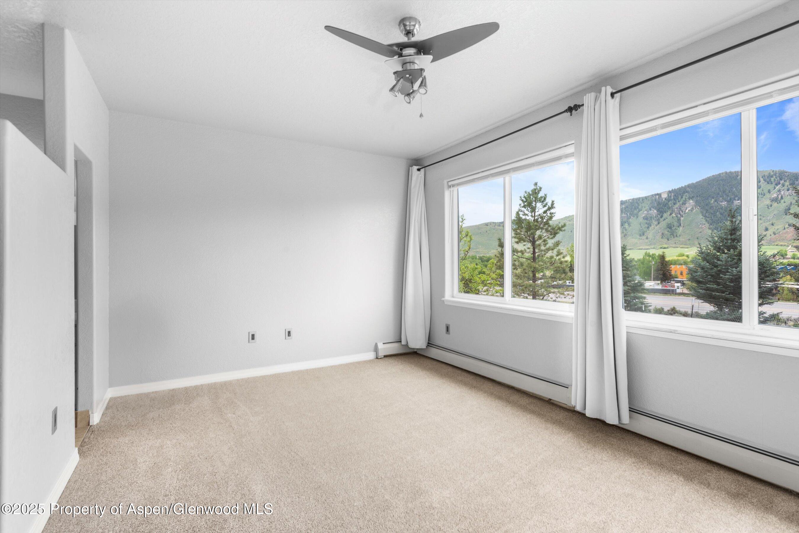 21 Pine Ridge Road Basalt, CO 81621 - Photo 10 of 25 an empty room with windows and view