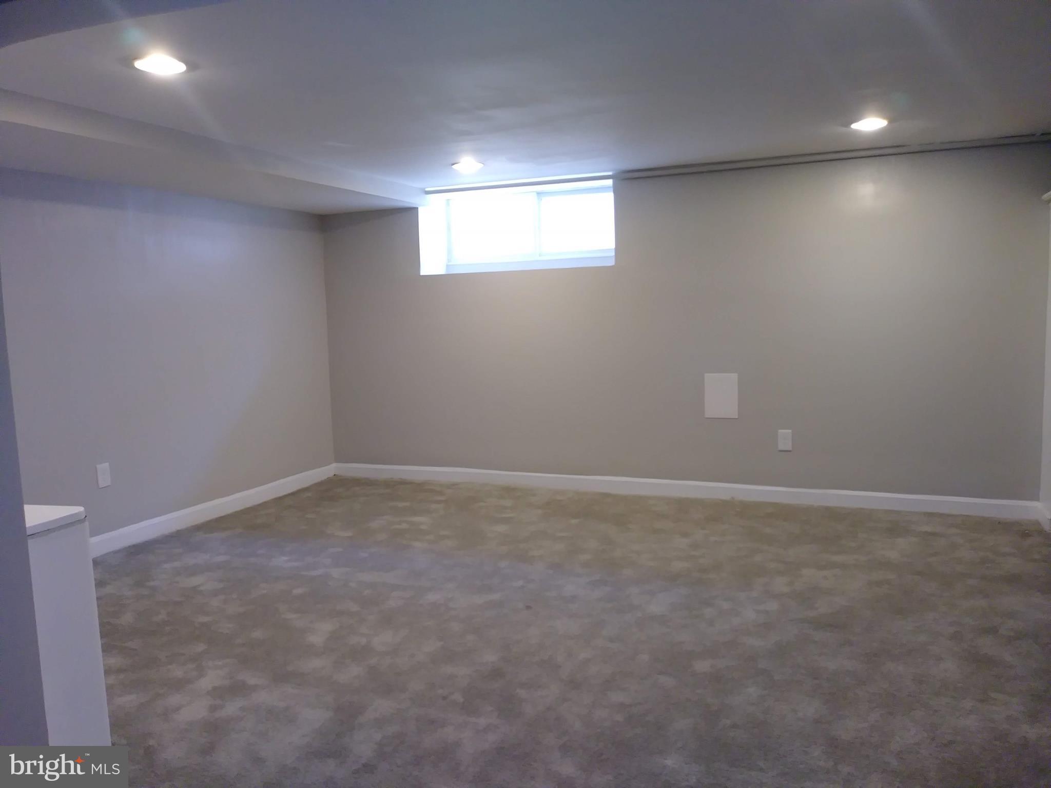 3812 Ednor Road Baltimore, MD 21218 - Photo 17 of 22 an empty room with a window