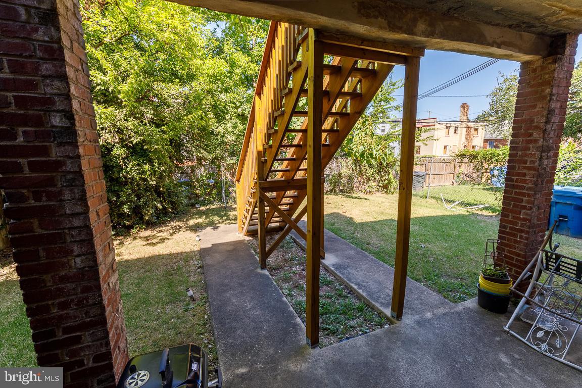 430 Mellon Street Southeast, Unit 2 Washington, DC 20032 - Photo 20 of 20 a view of a yard from a balcony
