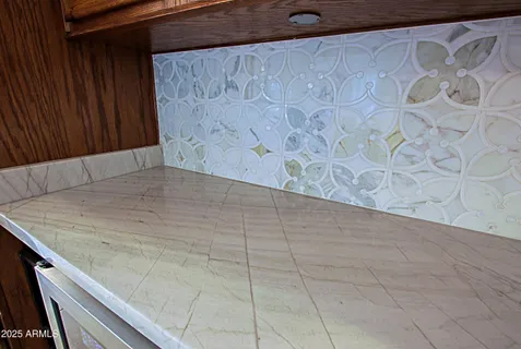 a view of a swimming pool with an outdoor seating