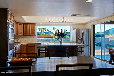 an aerial view of city and lake