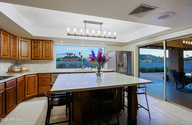a living room with furniture and white walls