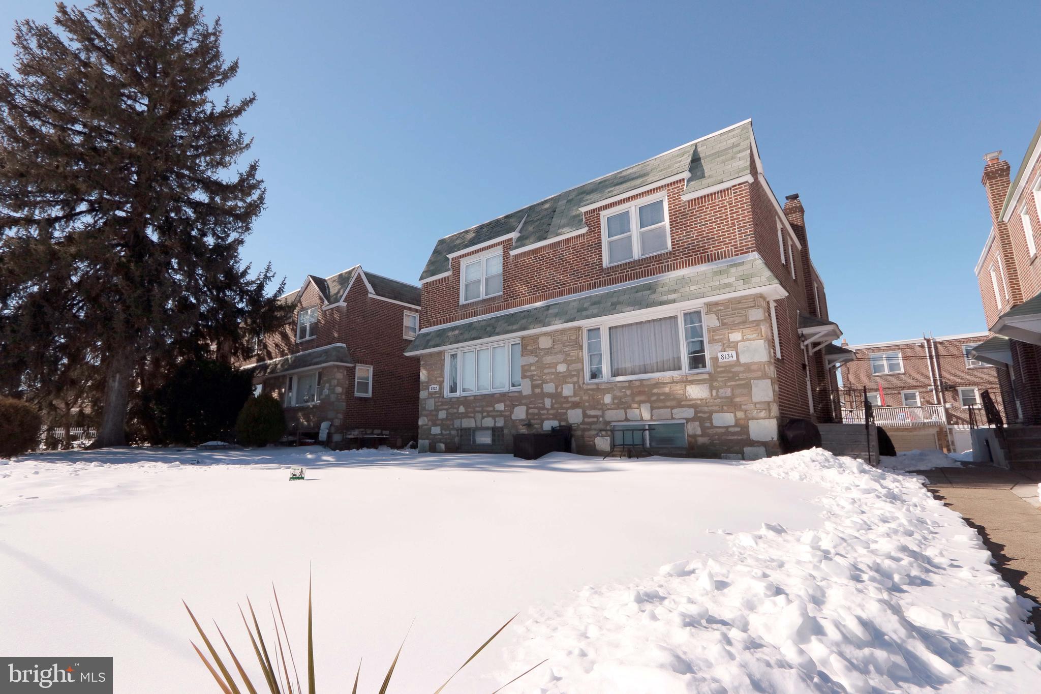 a street view covered with snow