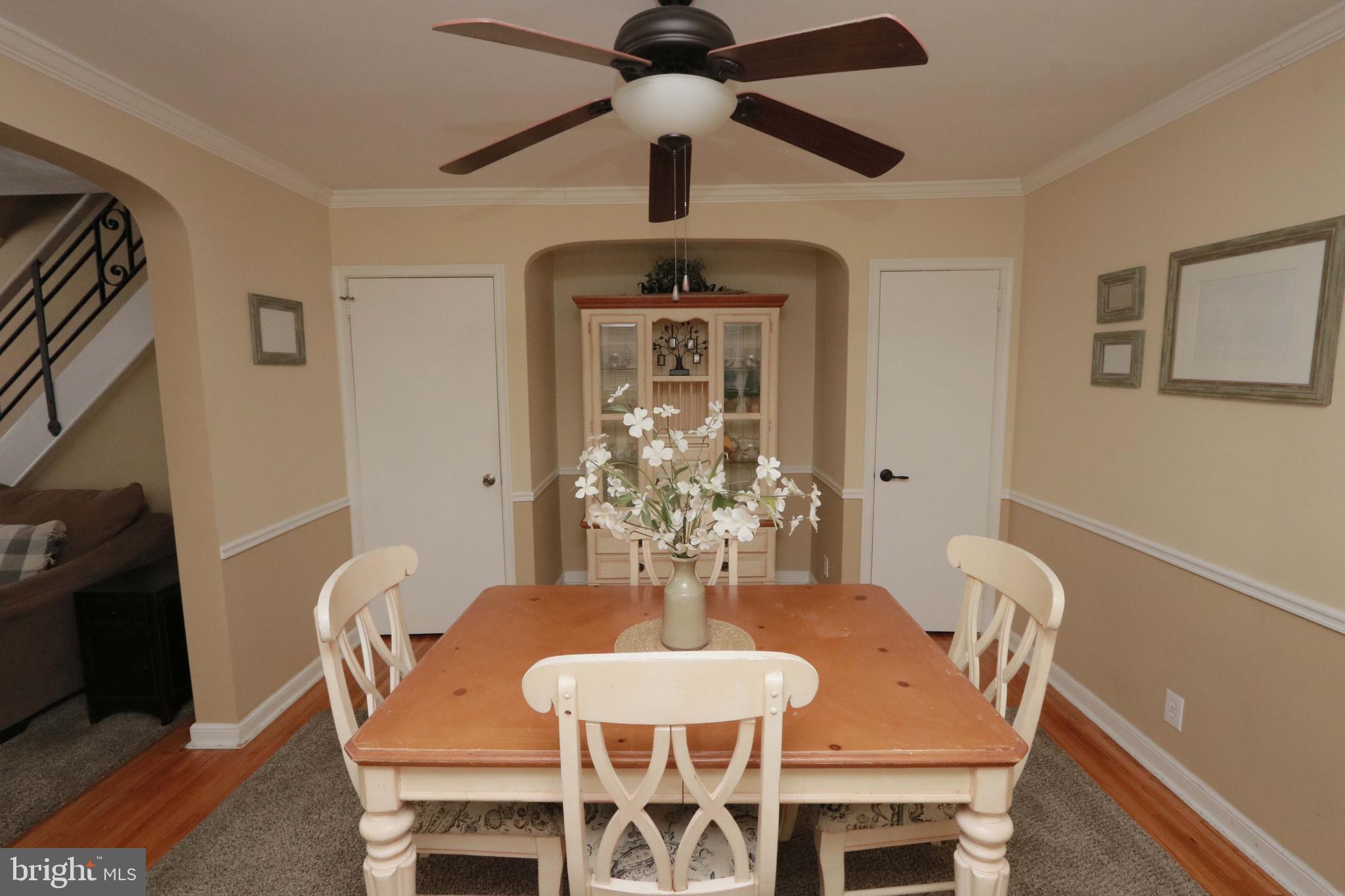 8134 Revere Street Philadelphia, PA 19152 - Photo 13 of 49 a view of a dining room with furniture wooden floor and chandelier