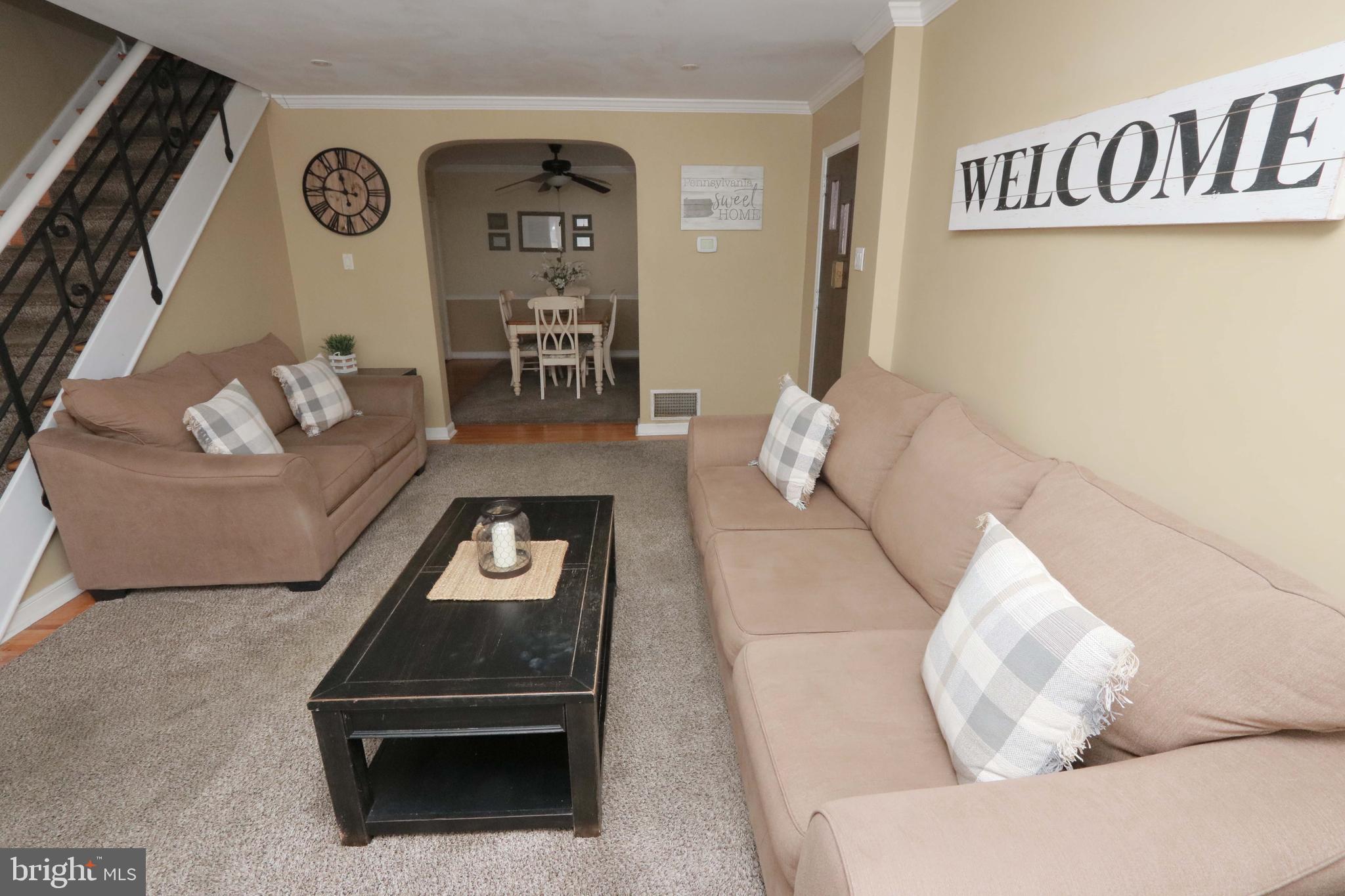 8134 Revere Street Philadelphia, PA 19152 - Photo 14 of 49 a living room with furniture and a table
