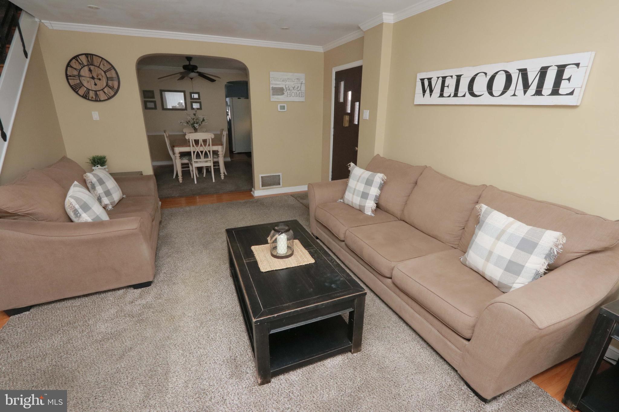 8134 Revere Street Philadelphia, PA 19152 - Photo 15 of 49 a living room with furniture and a table