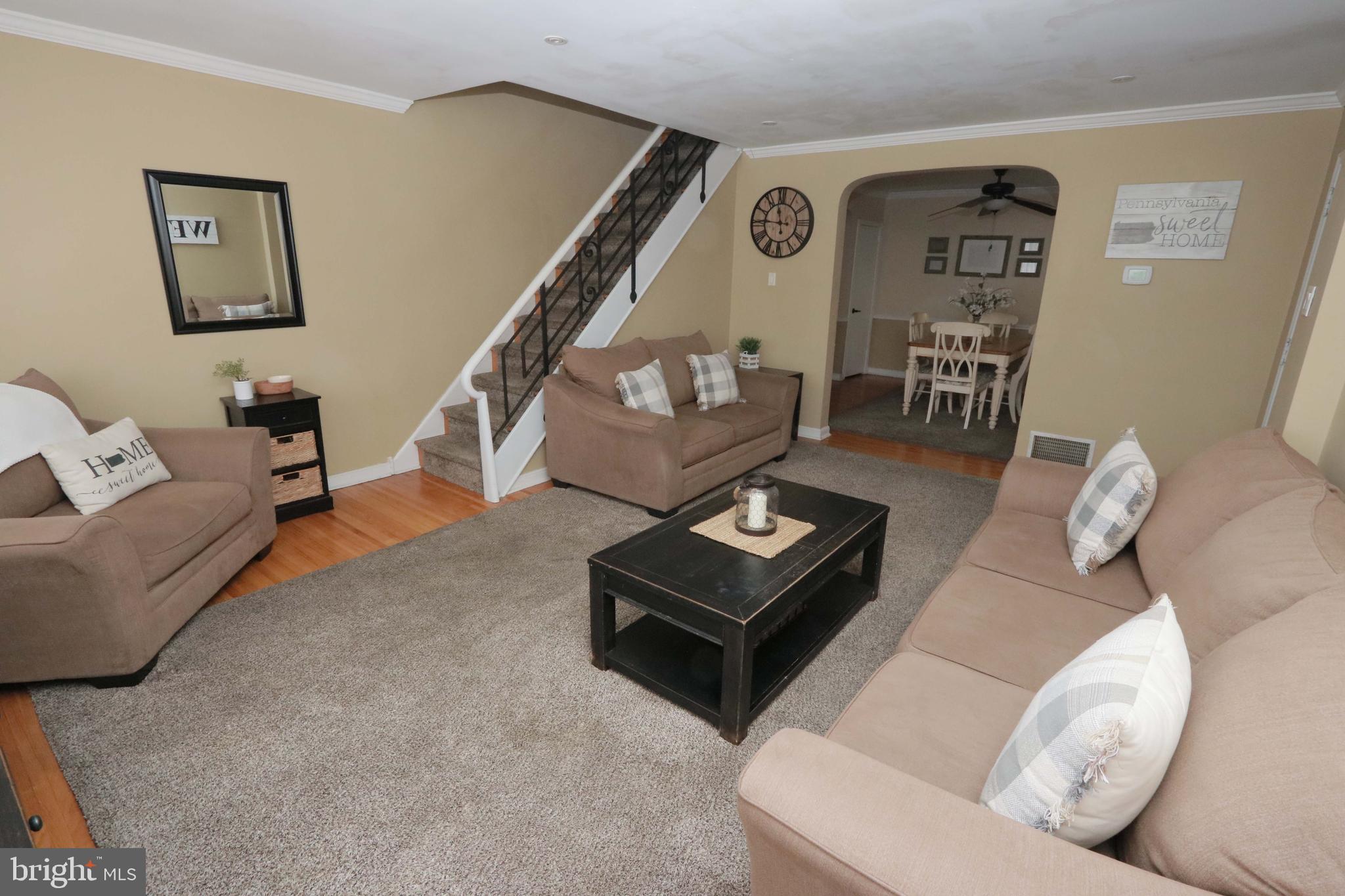 8134 Revere Street Philadelphia, PA 19152 - Photo 17 of 49 a living room with furniture and wooden floor