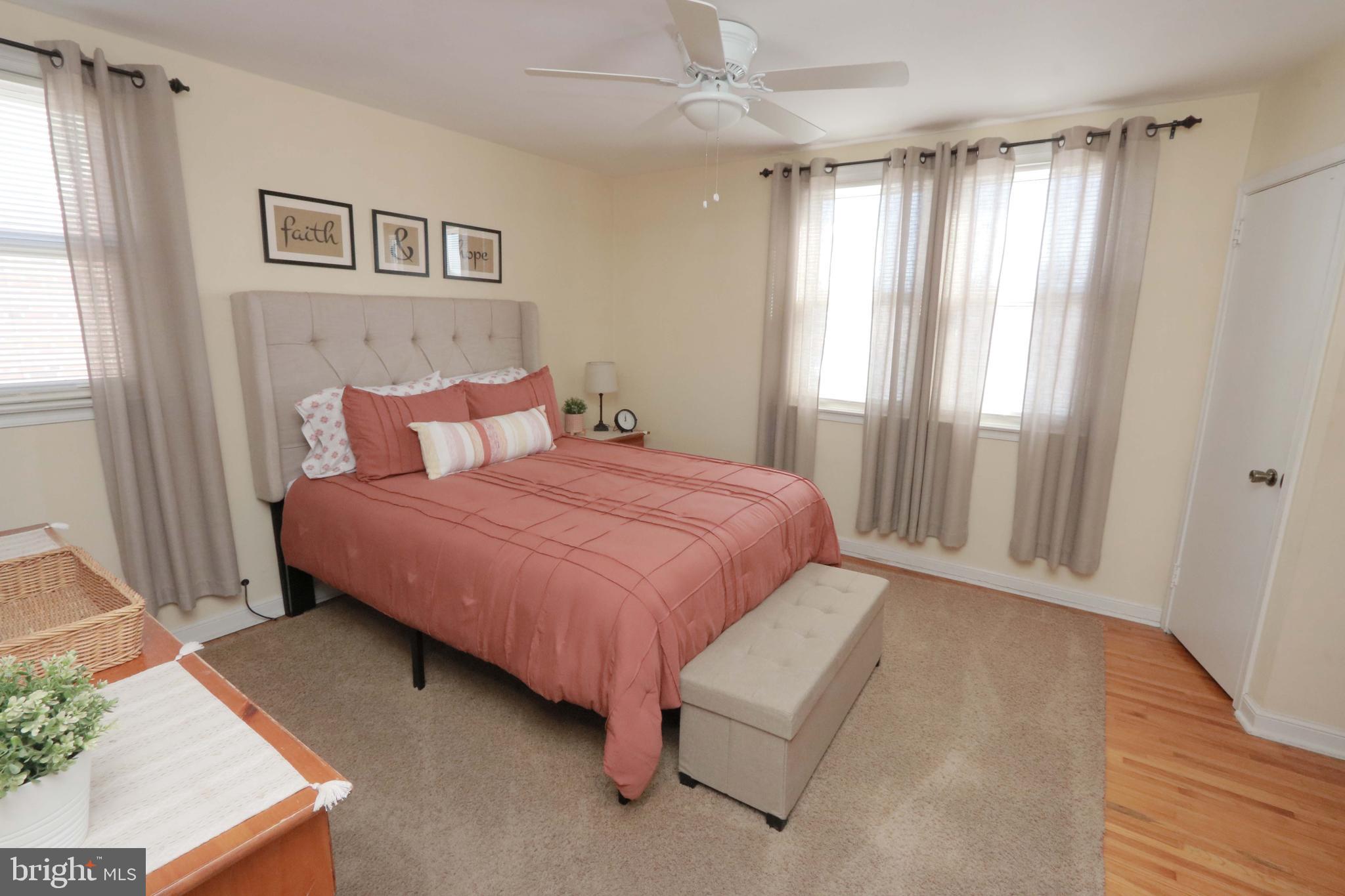 8134 Revere Street Philadelphia, PA 19152 - Photo 23 of 49 a spacious bedroom with a bed and a window