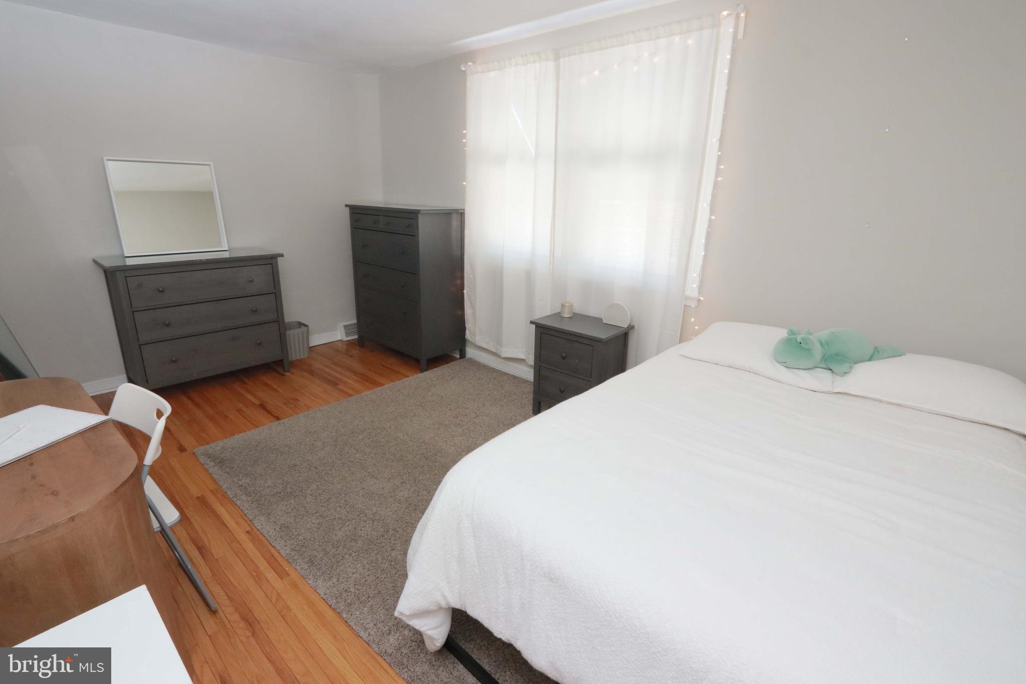 8134 Revere Street Philadelphia, PA 19152 - Photo 27 of 49 a bedroom with a bed and dresser